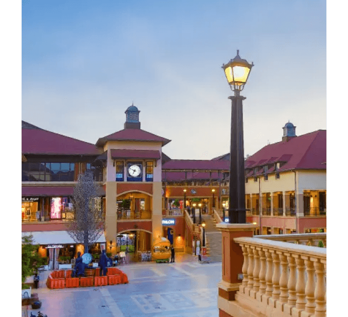 The Hub Karen exterior view at dusk